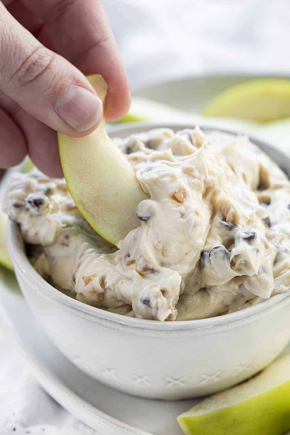 Dipping Apple into Apple Toffee Dip